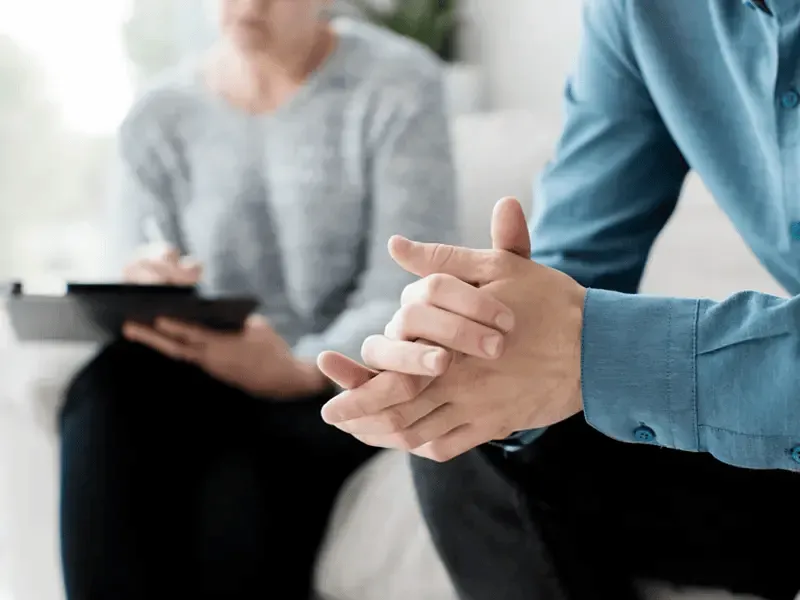 Therapist and client collaborating on personalized therapy goals for PTSD